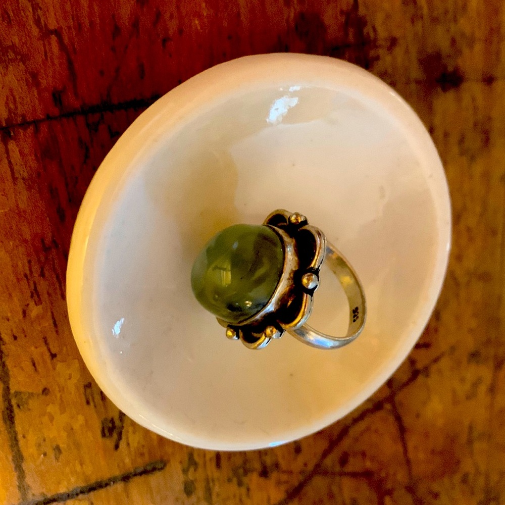 Size 8 sterling ring with pale green stone